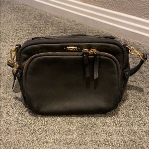 Leather Tumi Voyageur Crossbody in black